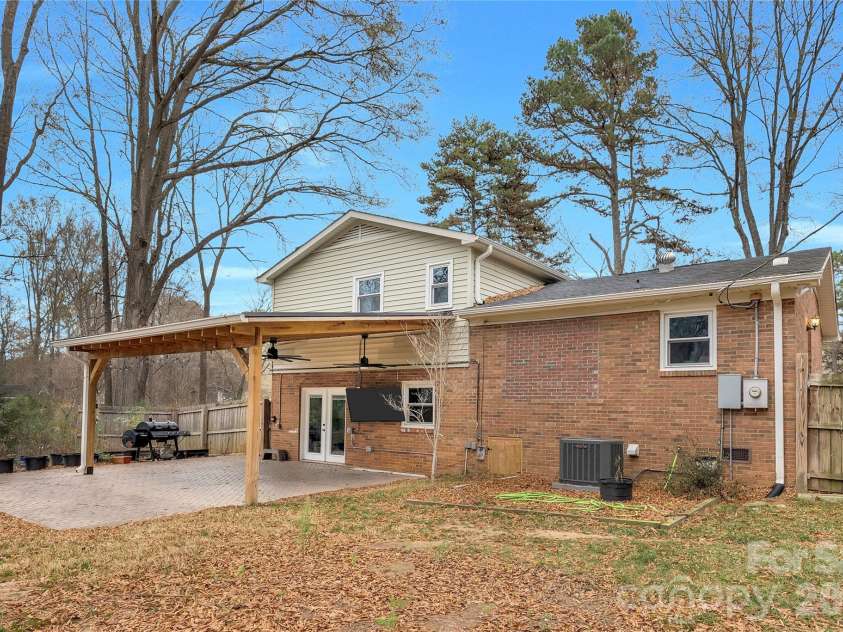1825 Winfield Drive, Monroe, NC 28110.  MLS# CAR4364944, YatesRealty ID 35348. Stamped concrete back patio