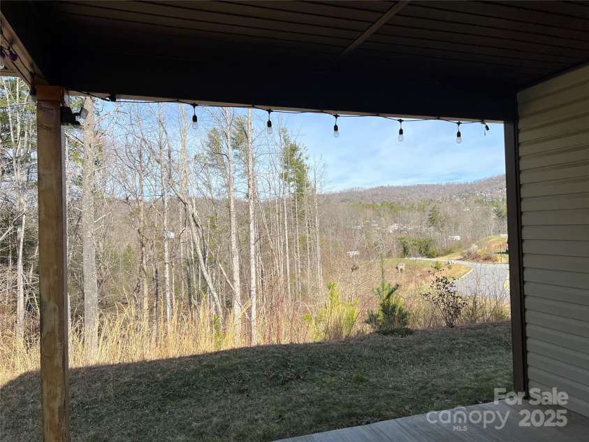 105 Water Leaf Drive, Weaverville, NC 28787.  MLS# CAR4240720, YatesRealty ID 3535. Mountain views from covered rear porch