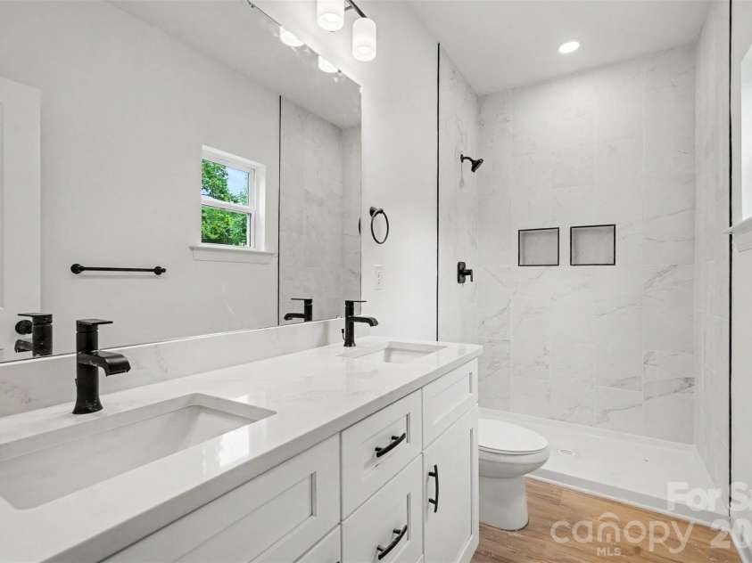 327 Whispering Pines Drive, Charlotte, NC 28217.  MLS# CAR4397862, YatesRealty ID 35353. Master bath