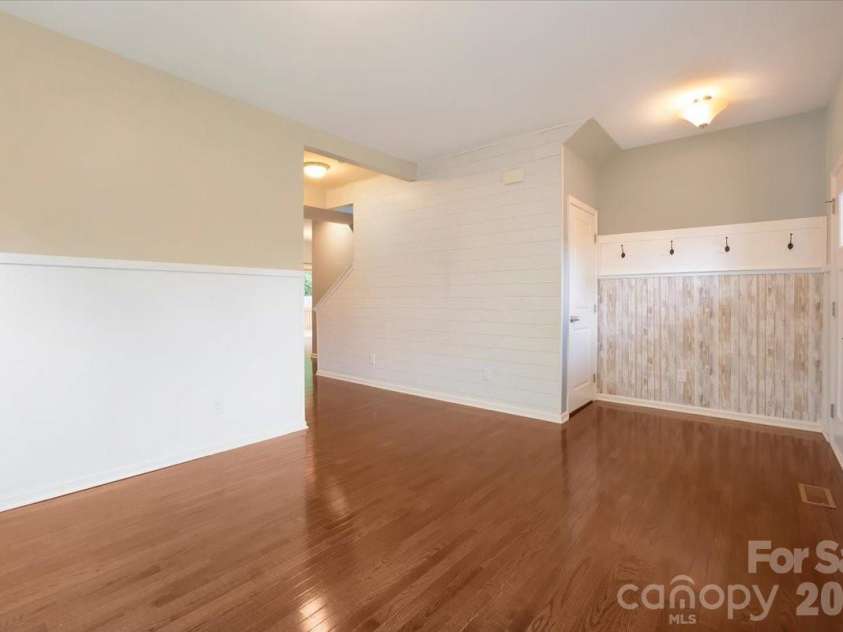 278 Almora Loop, Mooresville, NC 28115.  MLS# CAR4390826, YatesRealty ID 35356. Dining room/living room/ study with a drop zone