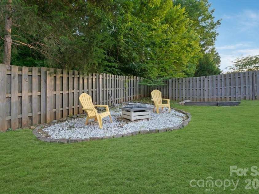 278 Almora Loop, Mooresville, NC 28115.  MLS# CAR4390826, YatesRealty ID 35356. Fire pit to enjoy all your evenings