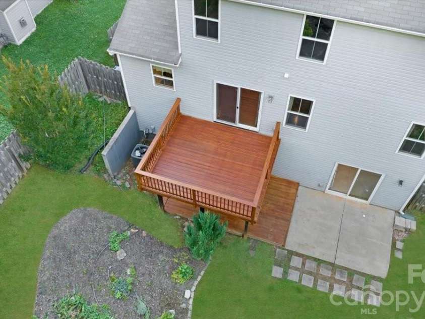 278 Almora Loop, Mooresville, NC 28115.  MLS# CAR4390826, YatesRealty ID 35356. Large private lot with newly installed deck