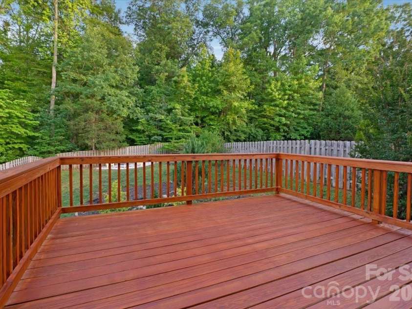278 Almora Loop, Mooresville, NC 28115.  MLS# CAR4390826, YatesRealty ID 35356. Newly installed deck overlooking a private fenced in yard