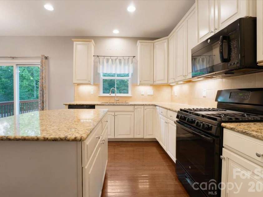 278 Almora Loop, Mooresville, NC 28115.  MLS# CAR4390826, YatesRealty ID 35356. Open kitchen with Island