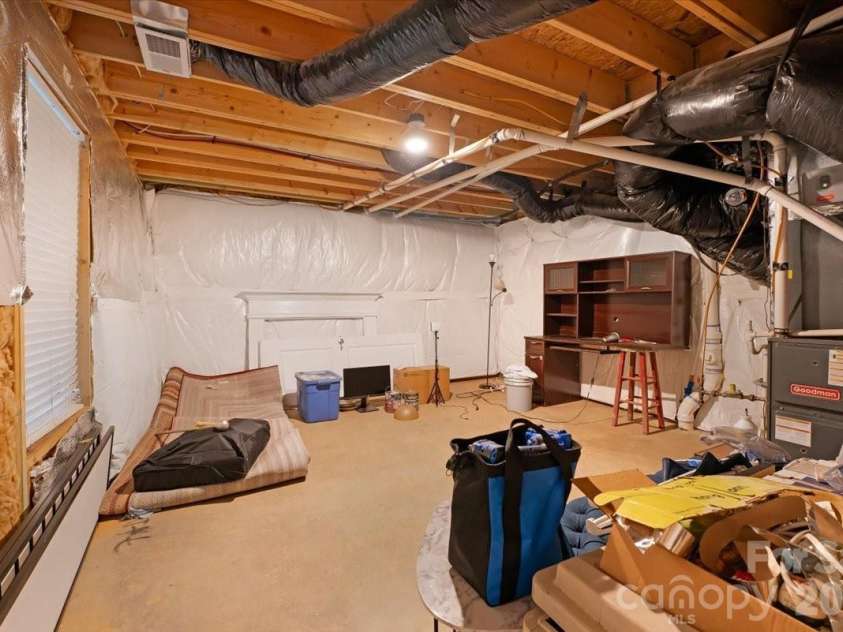 278 Almora Loop, Mooresville, NC 28115.  MLS# CAR4390826, YatesRealty ID 35356. Open storage area on basement level