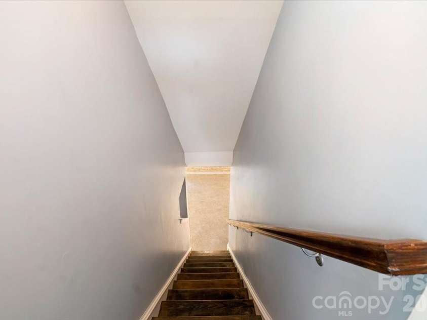 278 Almora Loop, Mooresville, NC 28115.  MLS# CAR4390826, YatesRealty ID 35356. Stairs to basement