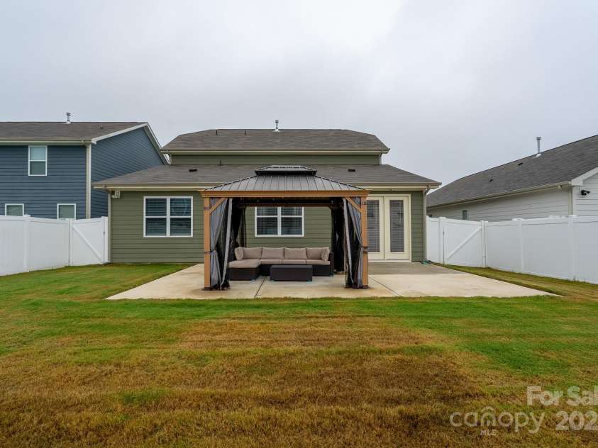 6023 Walkers Run Drive, Monroe, NC 28110.  MLS# CAR4292424, YatesRealty ID 35358. Back of home