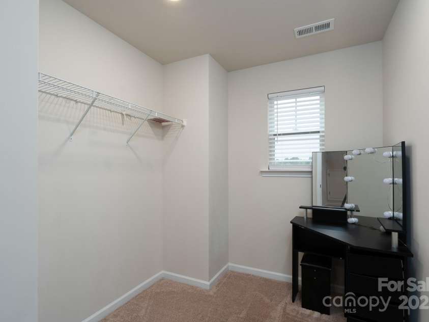 6023 Walkers Run Drive, Monroe, NC 28110.  MLS# CAR4292424, YatesRealty ID 35358. Hall closet in Foyer 2nd Level