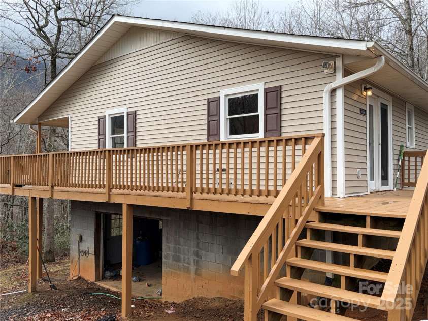 249 Cherry Hollow Road, Burnsville, NC 28714.  MLS# CAR4322750, YatesRealty ID 3536. All New Decking!