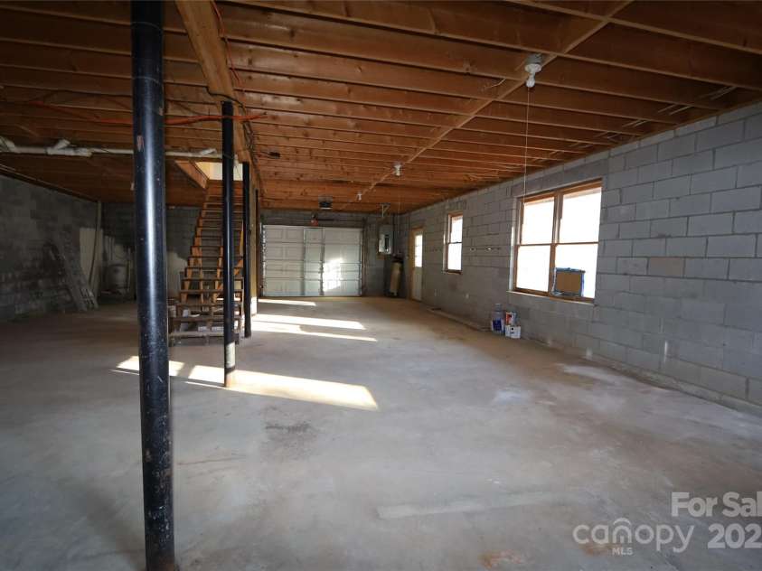249 Cherry Hollow Road, Burnsville, NC 28714.  MLS# CAR4322750, YatesRealty ID 3536. High Ceilings for Easy Expansion! Family Game Room/ Man Cave/ Workshop, Etc.