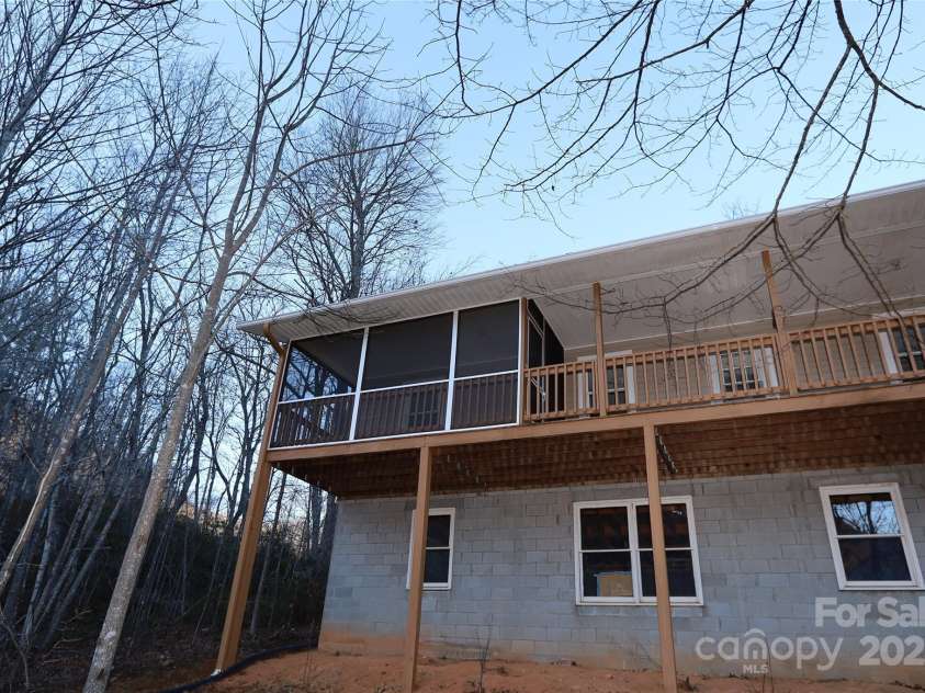 249 Cherry Hollow Road, Burnsville, NC 28714.  MLS# CAR4322750, YatesRealty ID 3536. New Screened Porch.