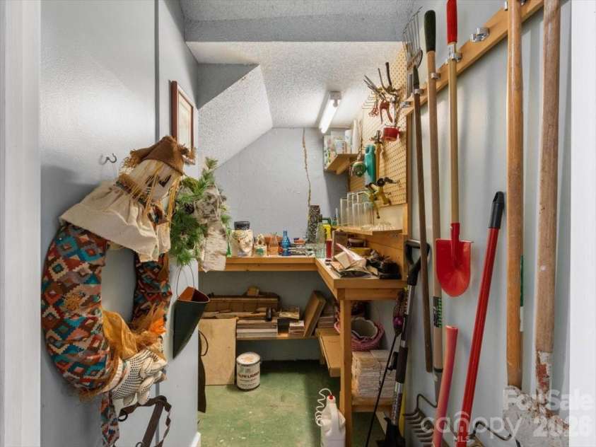 1355 Moonshine Mountain Road, Burnsville, NC 28714.  MLS# CAR4400046, YatesRealty ID 35360. Basement Potting Shed