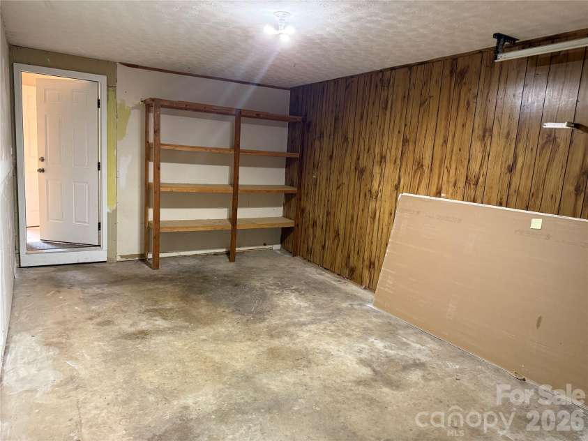 32 Mayfair Drive, Candler, NC 28715.  MLS# CAR4392323, YatesRealty ID 35365. Attached garage