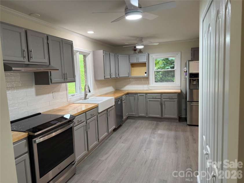 32 Mayfair Drive, Candler, NC 28715.  MLS# CAR4392323, YatesRealty ID 35365. Remodeled kitchen