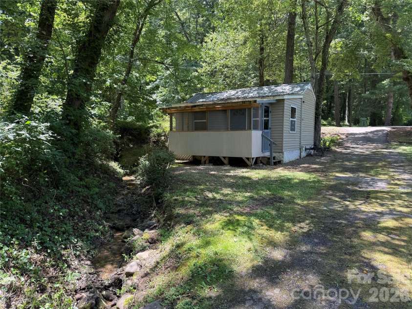 32 Mayfair Drive, Candler, NC 28715.  MLS# CAR4392323, YatesRealty ID 35365. Tiny home