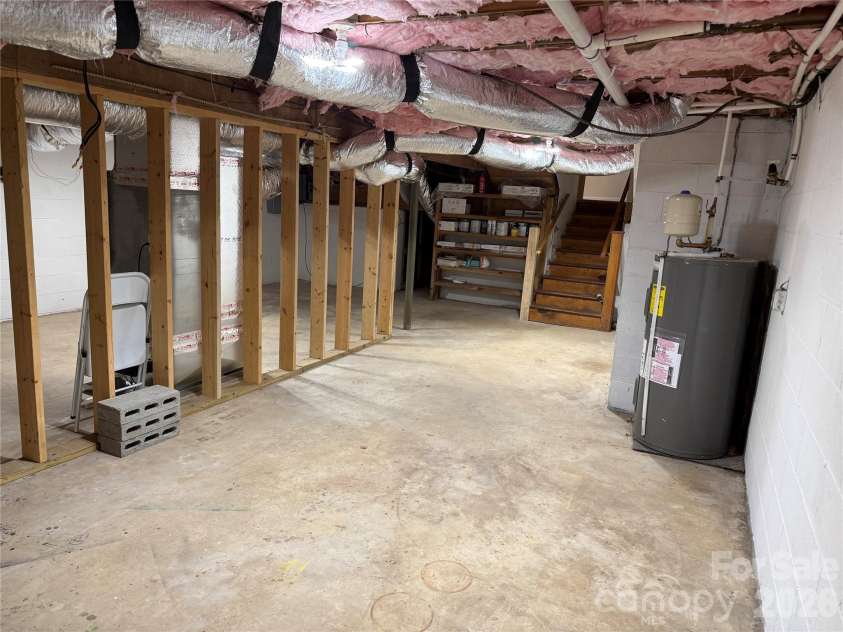 32 Mayfair Drive, Candler, NC 28715.  MLS# CAR4392323, YatesRealty ID 35365. Very dry basement