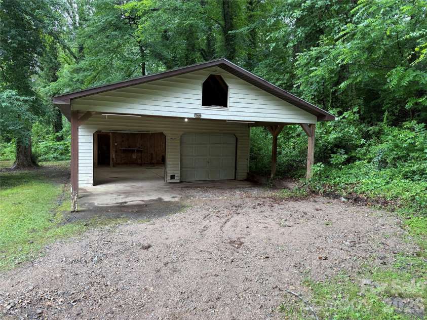 32 Mayfair Drive, Candler, NC 28715.  MLS# CAR4392323, YatesRealty ID 35365. Workshop/detached garage/possible studio.