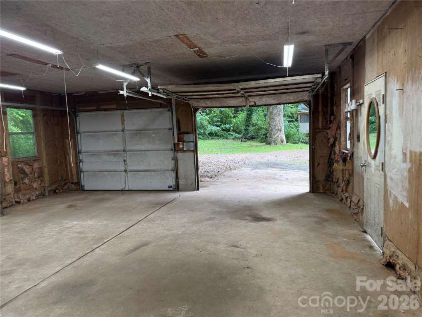 32 Mayfair Drive, Candler, NC 28715.  MLS# CAR4392323, YatesRealty ID 35365. Workshop/detached garage/possible studio.