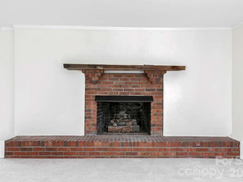 100 Kilpatrick Street, Brevard, NC 28712.  MLS# CAR4382761, YatesRealty ID 35369. Fireplace