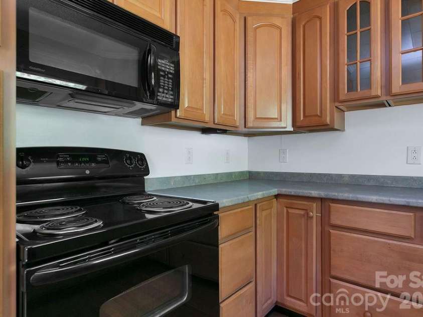 100 Kilpatrick Street, Brevard, NC 28712.  MLS# CAR4382761, YatesRealty ID 35369. Kitchen