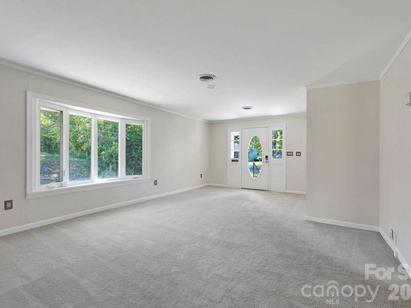100 Kilpatrick Street, Brevard, NC 28712.  MLS# CAR4382761, YatesRealty ID 35369. Living room