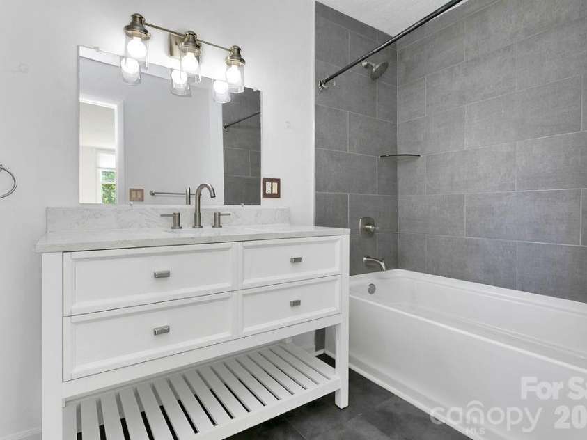 100 Kilpatrick Street, Brevard, NC 28712.  MLS# CAR4382761, YatesRealty ID 35369. Primary bathroom