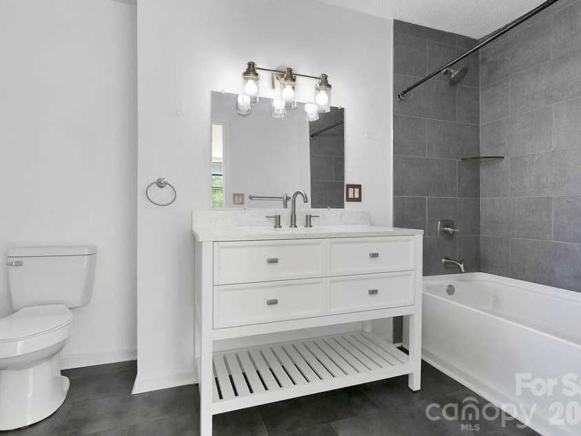 100 Kilpatrick Street, Brevard, NC 28712.  MLS# CAR4382761, YatesRealty ID 35369. Primary bathroom
