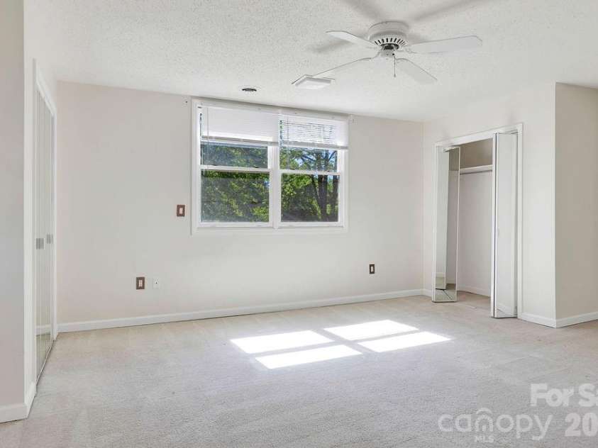 100 Kilpatrick Street, Brevard, NC 28712.  MLS# CAR4382761, YatesRealty ID 35369. Primary Bedroom