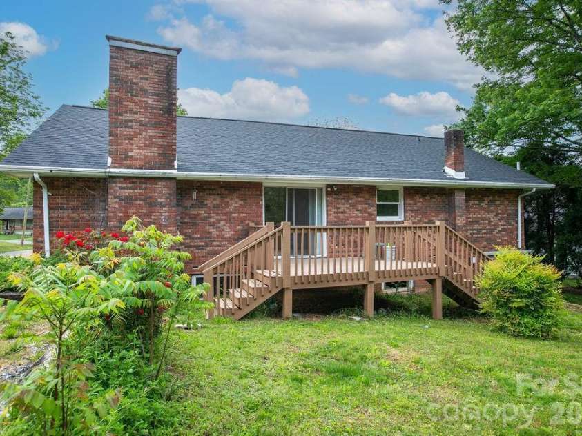 100 Kilpatrick Street, Brevard, NC 28712.  MLS# CAR4382761, YatesRealty ID 35369. Rear of home