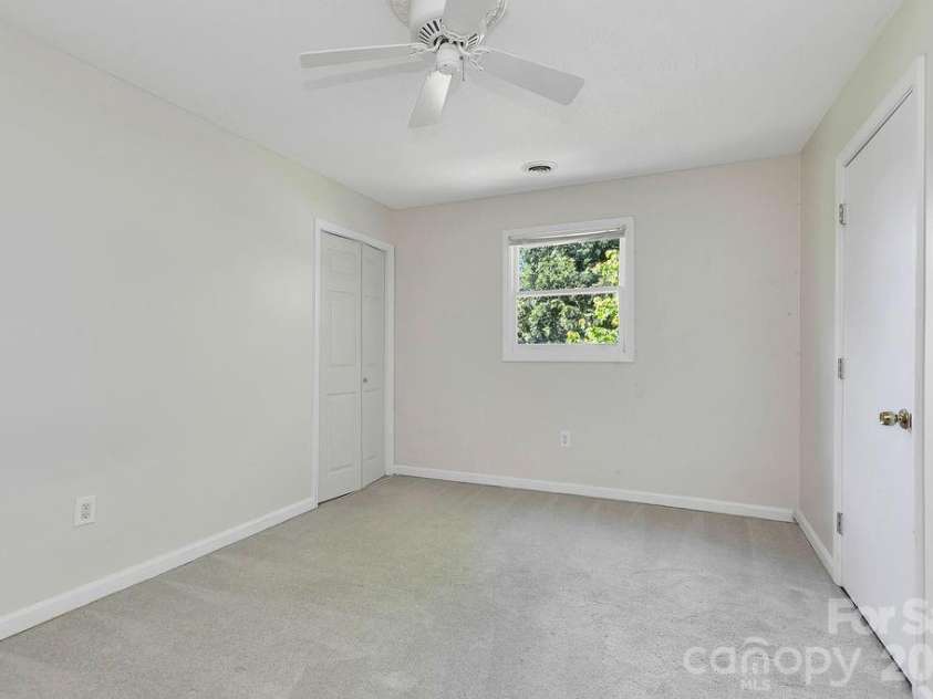 100 Kilpatrick Street, Brevard, NC 28712.  MLS# CAR4382761, YatesRealty ID 35369. Third bedroom - shares bathroom with fourth bedroom