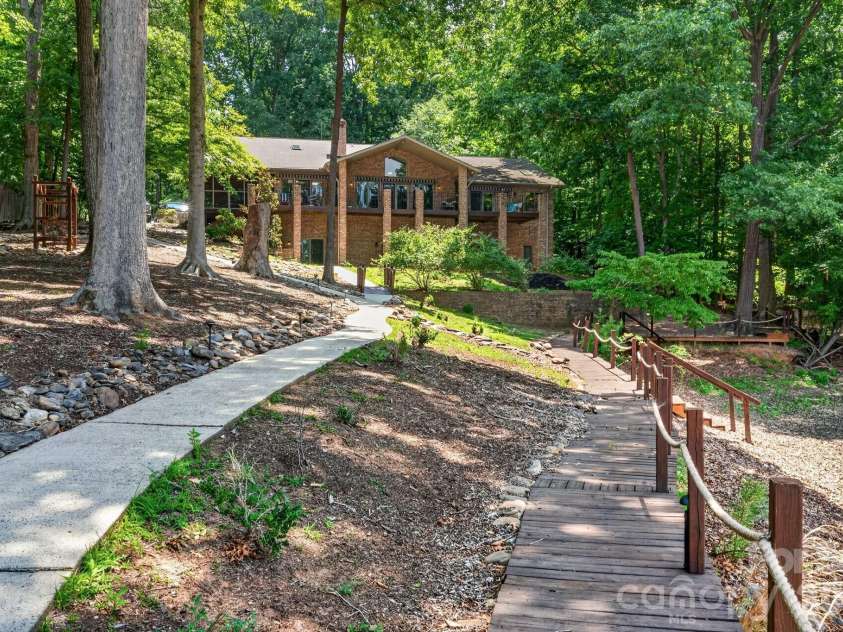 105 Quail Lane, Mooresville, NC 28117.  MLS# CAR4394602, YatesRealty ID 35375. Back yard