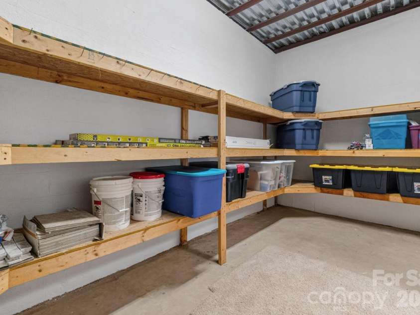 105 Quail Lane, Mooresville, NC 28117.  MLS# CAR4394602, YatesRealty ID 35375. Basement storage