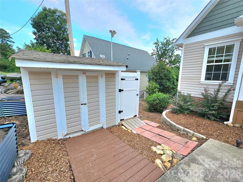 3526 Pinehaven Drive, New London, NC 28127.  MLS# CAR4397481, YatesRealty ID 35376. Nice storage building and new trash can enclosure