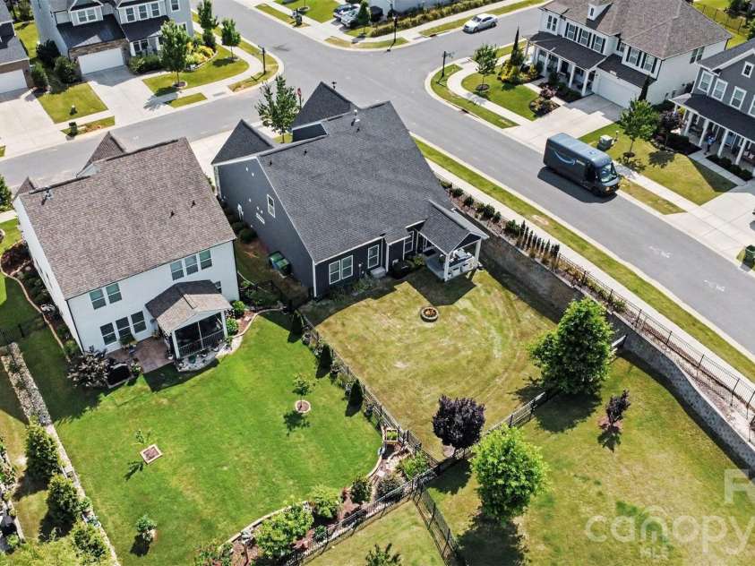 6247 Six String Court, Fort Mill, SC 29708.  MLS# CAR4337495, YatesRealty ID 35379. Aerial view of the back yard