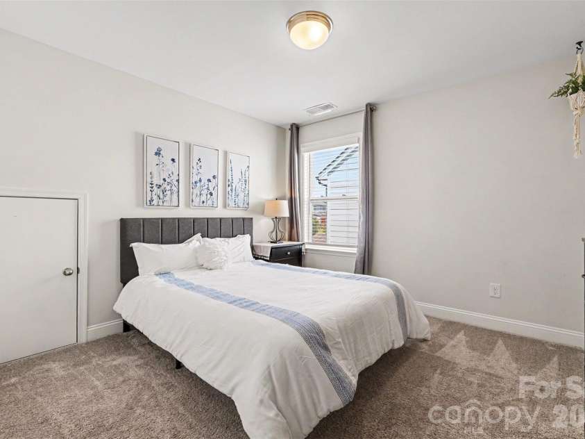 6247 Six String Court, Fort Mill, SC 29708.  MLS# CAR4337495, YatesRealty ID 35379. Guess bedroom 1 with en-suite bathroom