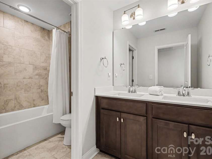 6247 Six String Court, Fort Mill, SC 29708.  MLS# CAR4337495, YatesRealty ID 35379. Second guest bathroom with hallway access