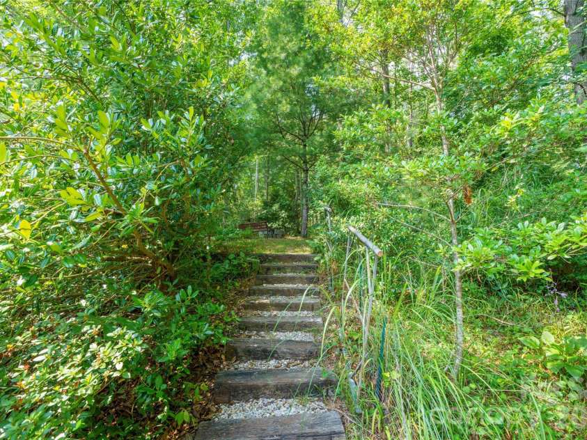 847 Lakeside Drive, Hendersonville, NC 28739.  MLS# CAR4398073, YatesRealty ID 35381. Steps to back yard and fire pit area