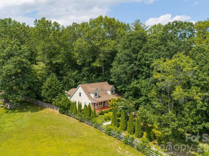 847 Lakeside Drive, Hendersonville, NC 28739.  MLS# CAR4398073, YatesRealty ID 35381. Verdant setting