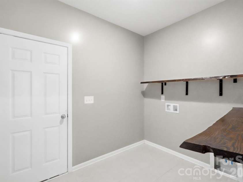 5111 Devonshire Road, Denver, NC 28037.  MLS# CAR4399324, YatesRealty ID 35384. Laundry Room