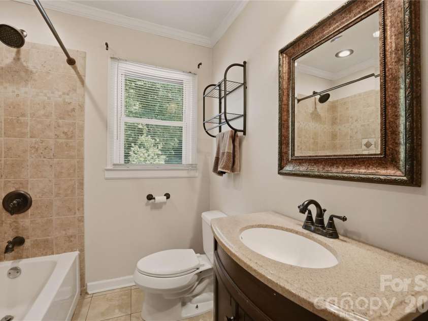 520 Eastway Avenue, Kannapolis, NC 28083.  MLS# CAR4396055, YatesRealty ID 35385. Bathroom number 2 centrally located between bedroom number2 and 3