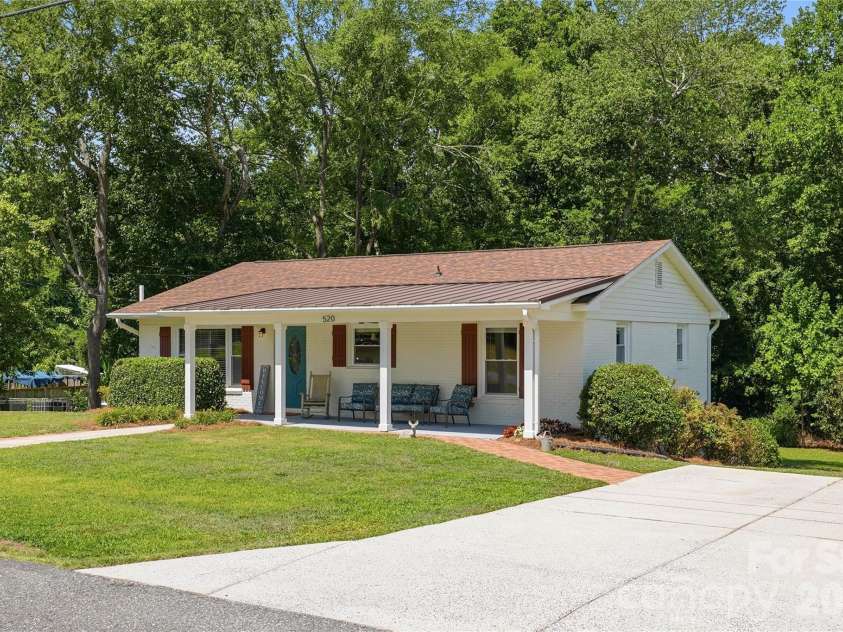 520 Eastway Avenue, Kannapolis, NC 28083.  MLS# CAR4396055, YatesRealty ID 35385. Concrete driveway that fits up to 4 vehicles.