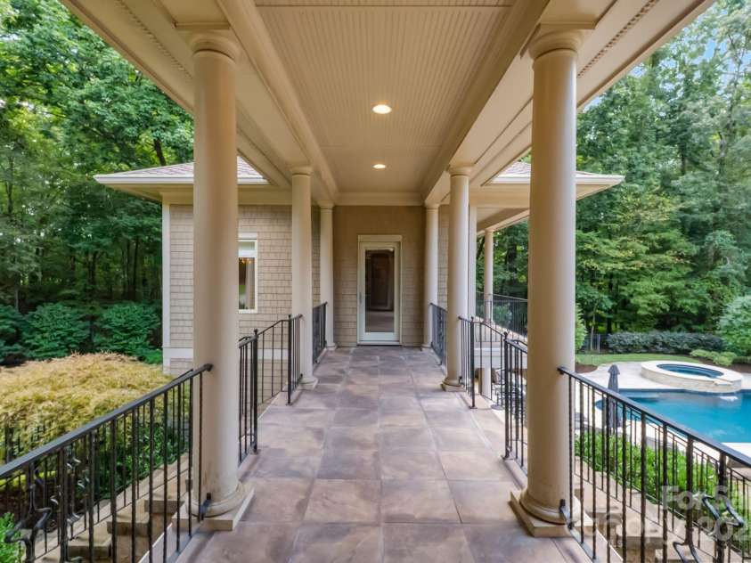 2915 Cutter Court, Waxhaw, NC 28173.  MLS# CAR4292425, YatesRealty ID 35386. Open Breezeway to furnished pool house