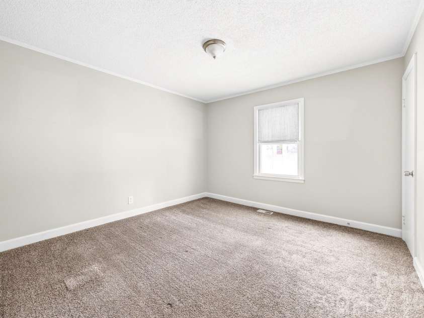 4525 Hemphill Road, Gastonia, NC 28056.  MLS# CAR4397707, YatesRealty ID 35394. Primary bedroom