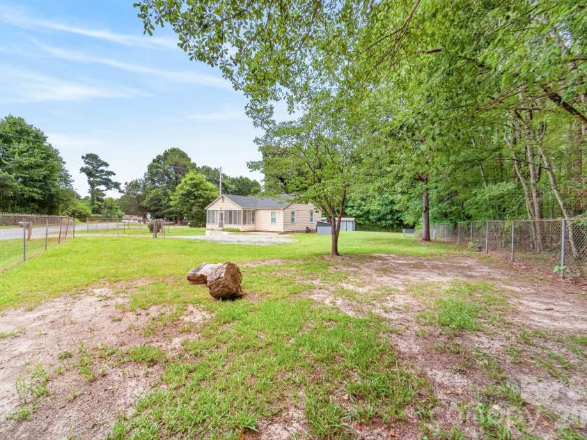 4525 Hemphill Road, Gastonia, NC 28056.  MLS# CAR4397707, YatesRealty ID 35394. Side yard