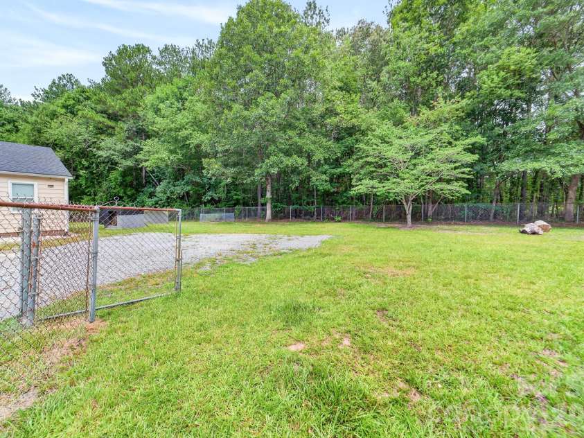 4525 Hemphill Road, Gastonia, NC 28056.  MLS# CAR4397707, YatesRealty ID 35394. Side yard