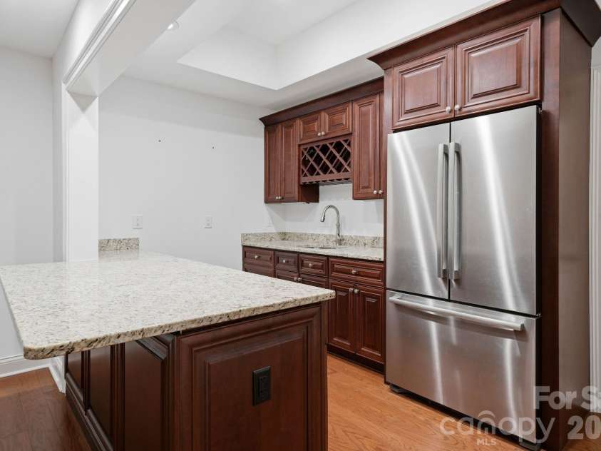 9414 Heydon Hall Circle, Charlotte, NC 28210.  MLS# CAR4421247, YatesRealty ID 35397. Basement Bar Area