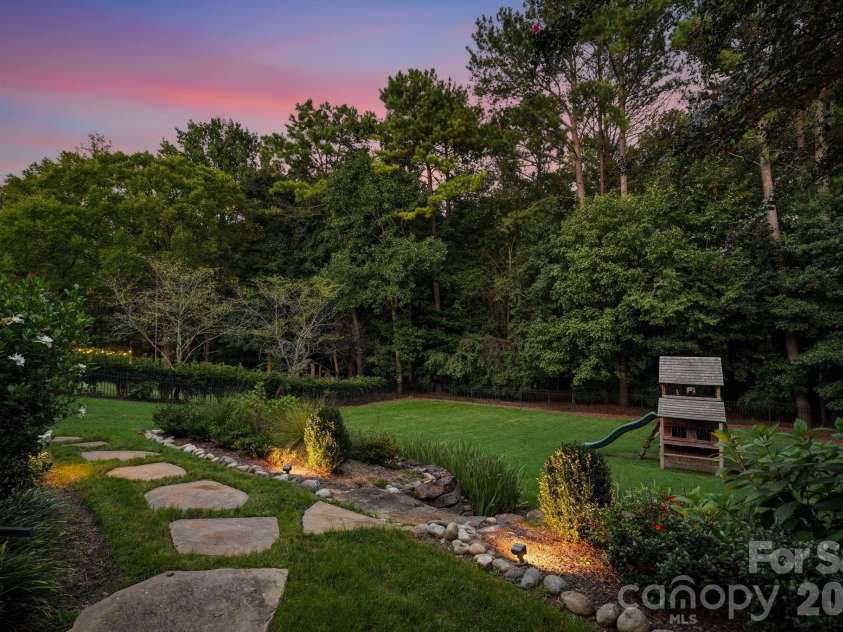 9414 Heydon Hall Circle, Charlotte, NC 28210.  MLS# CAR4421247, YatesRealty ID 35397. The Stunning Large Backyard