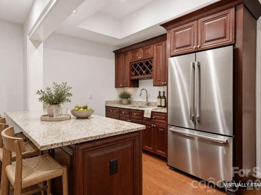 9414 Heydon Hall Circle, Charlotte, NC 28210.  MLS# CAR4421247, YatesRealty ID 35397. Virtually Staged Basement Bar Area