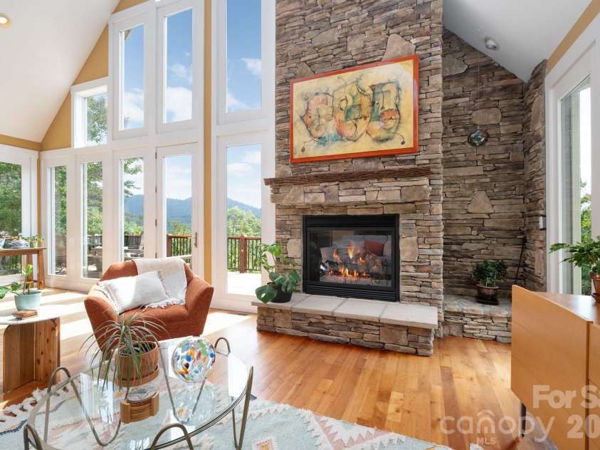 130 Black Oak Drive, Asheville, NC 28804.  MLS# CAR4395839, YatesRealty ID 35405. Impressive Soaring Stone Fireplace