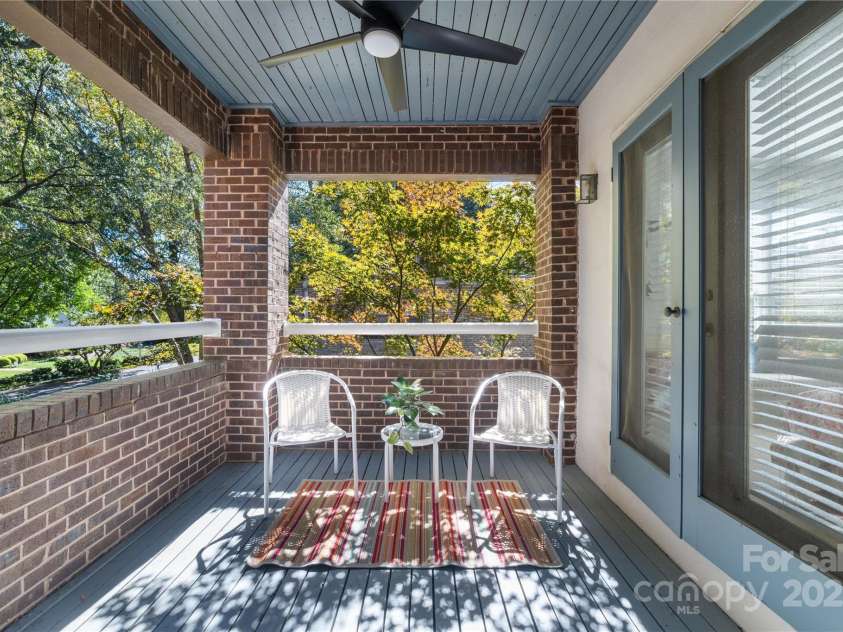 2220 Roswell Avenue, Charlotte, NC 28207.  MLS# CAR4312639, YatesRealty ID 35409. Dining and bedroom porch access